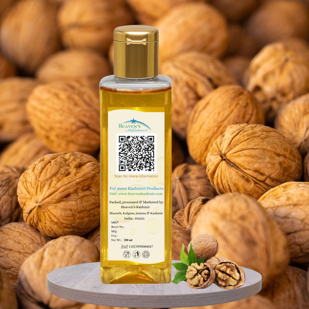 Walnut Oil 3 Heaven's Kashmir pure walnut oil displayed alongside raw Kashmiri Kagzi Akhrot, showcasing its natural, chemical-free extraction process